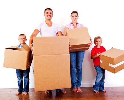 Local moving team handling boxes and household items