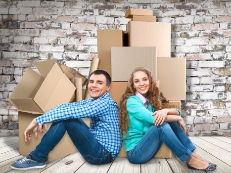 Hands completing a booking agreement for a man with van service