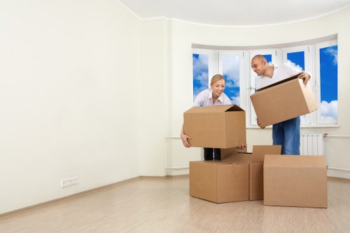 Office relocation planning in Upper Walthamstow with desks and moving boxes