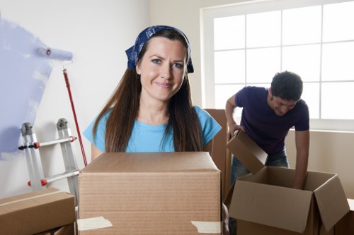 Unpacking boxes into rooms after a move in Upper Walthamstow