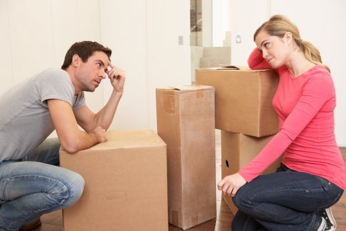 Packed office boxes and furniture ready for relocation