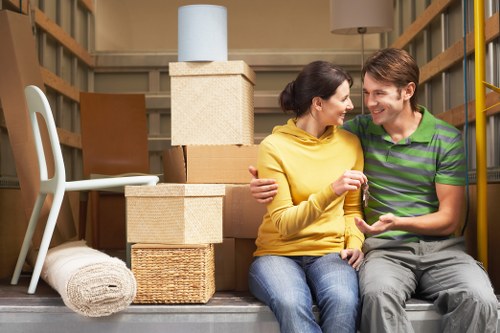 House removalists preparing boxes and furniture for delivery in Upper Walthamstow